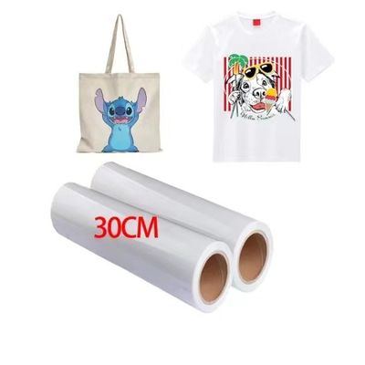 Maximice su potencial de impresión con materiales de impresión DTF 30cm*100m 75U Rollo de película de liberación para mascotas Peel frío de doble cara