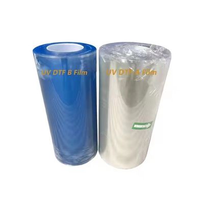Película para mascotas de DTF a frío caliente Ab A3 UV Roll Transparente de transferencia de DTF de 60 cm